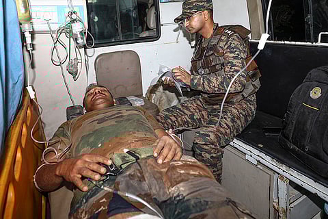 An injured soldier being taken to a hospital
